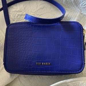 Ted Baker: purple cross body bag.